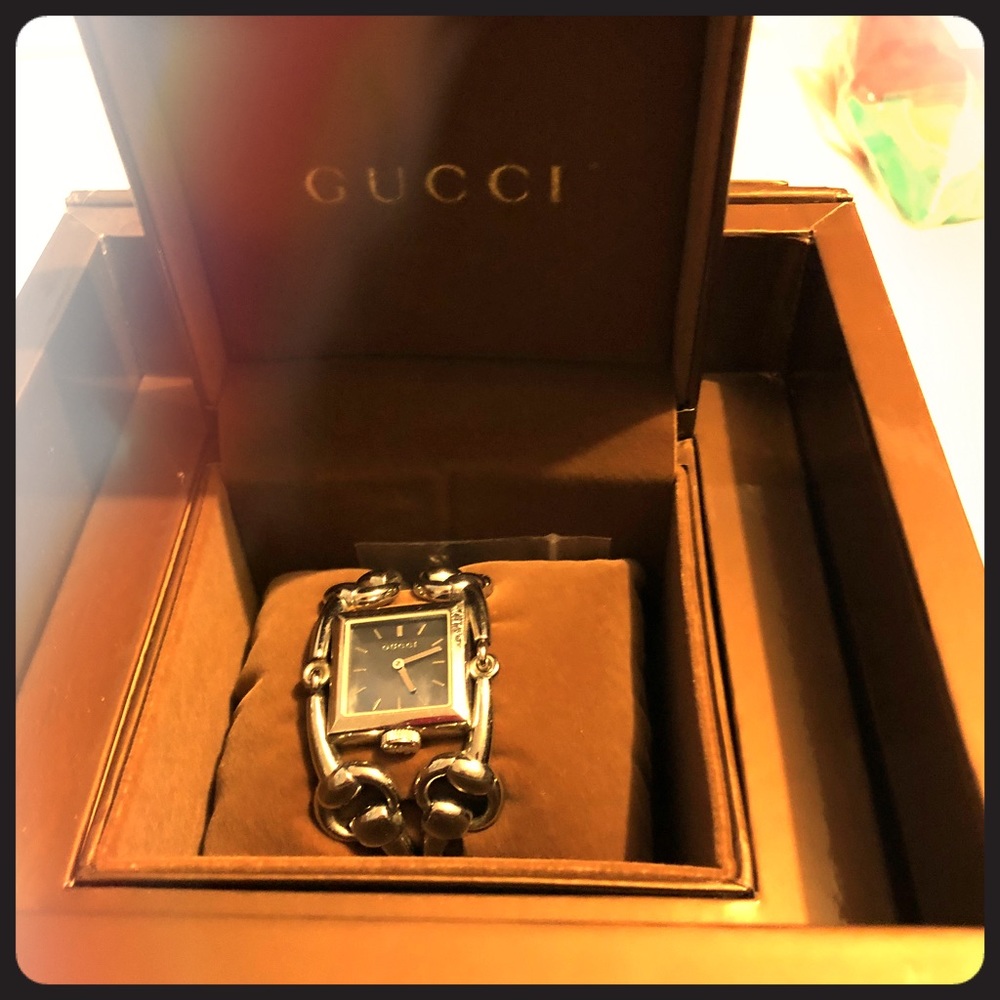 Silver buckle Gucci watch